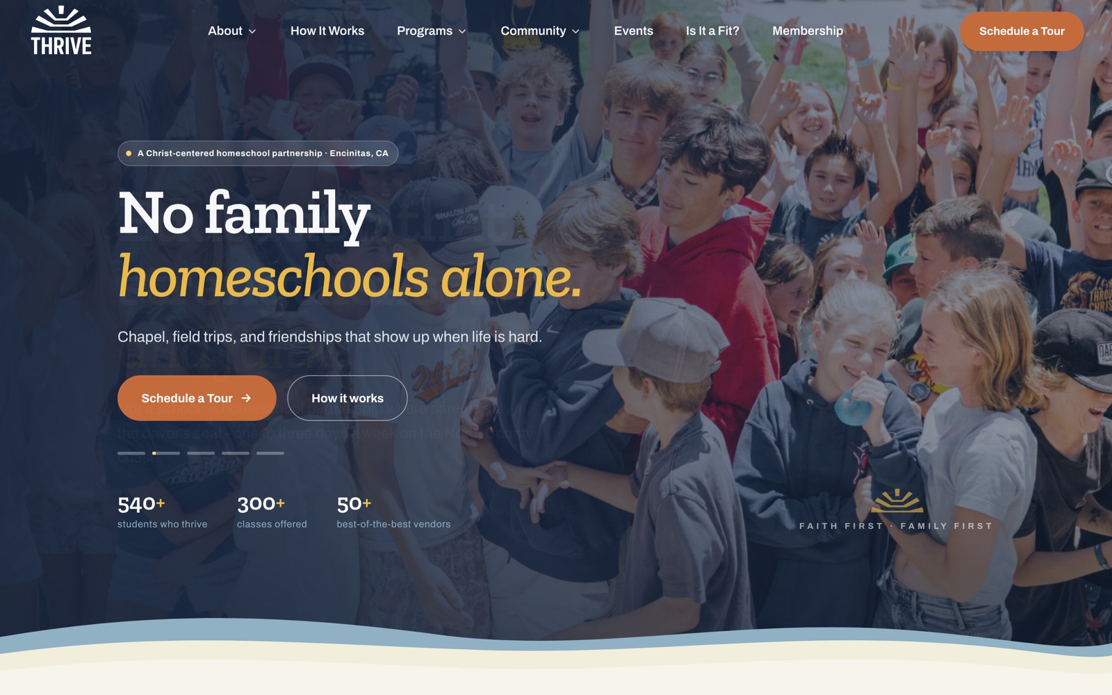 Thrive Learning Center homepage: No family homeschools alone, over a photo of students cheering